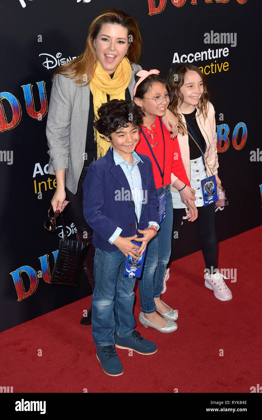 Alicia Machado and kids attending the world premiere of 'Dumbo' at the El Capitan Theatre on March 11;2019 in Los Angeles, California. Stock Photo