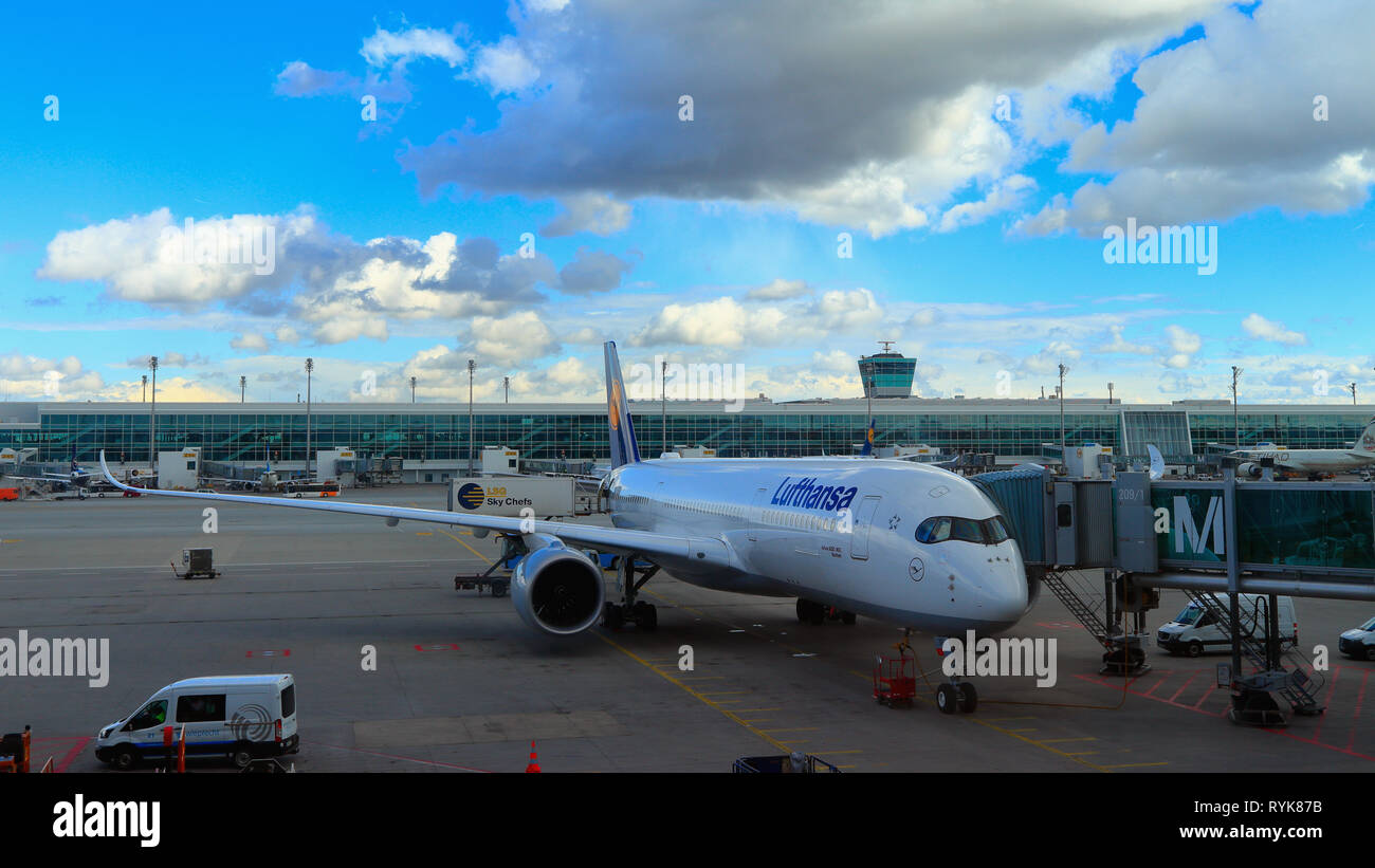 MUNICH, BAVARIA, GERMANY - MARCH 13, 2019: Lufthansa Airbus A350-900 Bochum twin-engine airliner with attached jet bridge at Munich Airport. Stock Photo