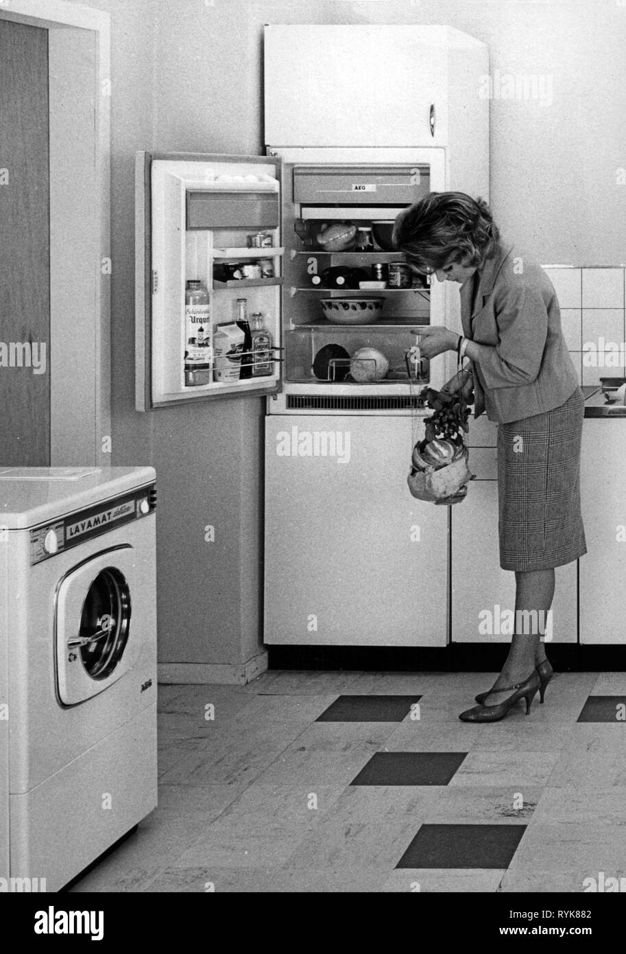 household, kitchen and kitchenware, young housewife in kitchen with household appliances by 'AEG', 1960s, Additional-Rights-Clearance-Info-Not-Available Stock Photo