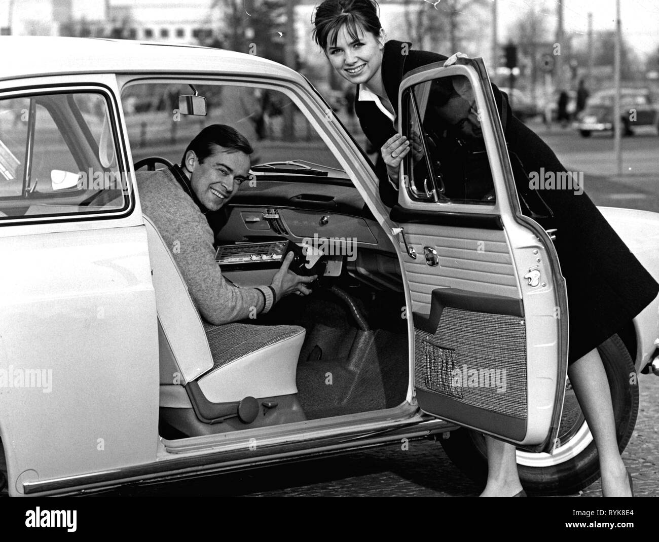 technics, consumer electronics, radio, a young man during the installation of a Telefunken car radio in his VW beetle, early 1960s, Additional-Rights-Clearance-Info-Not-Available Stock Photo