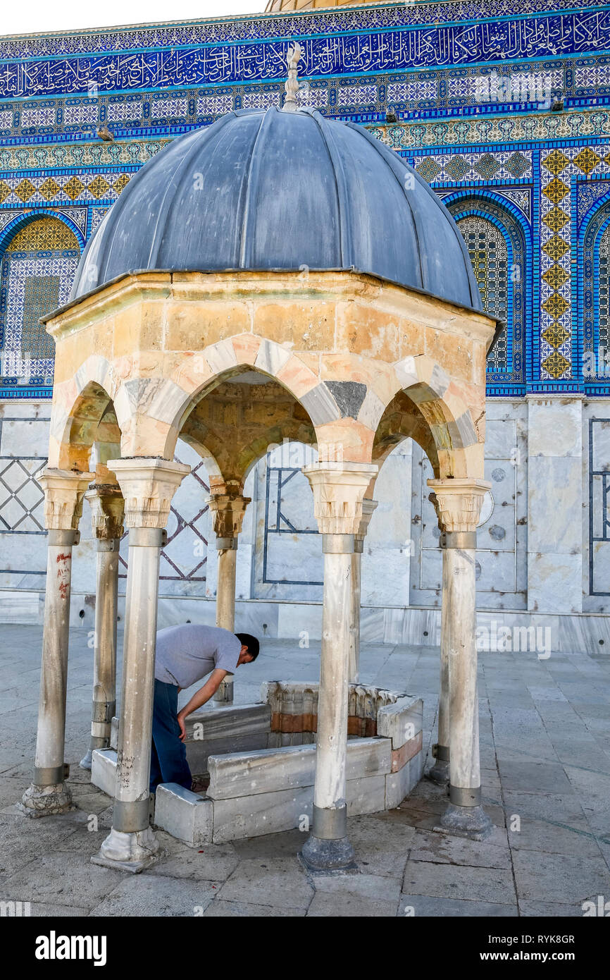 Man praying outside the Dome of the Rock, East Jerusalem, Israel. Stock Photo