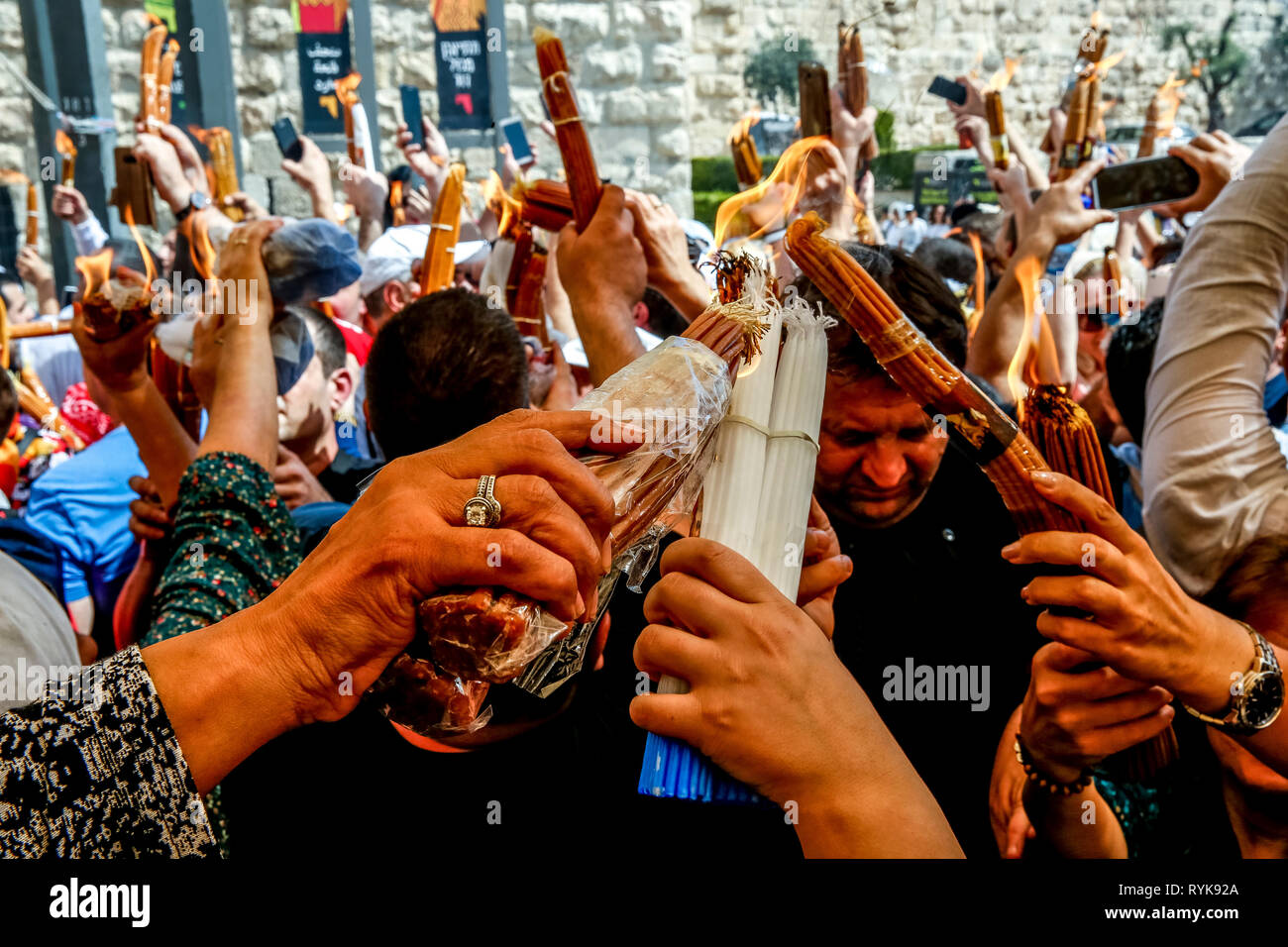 Christians celebrating orthodox Easter in Jerusalem, Israel. Holy fire ceremony. Stock Photo