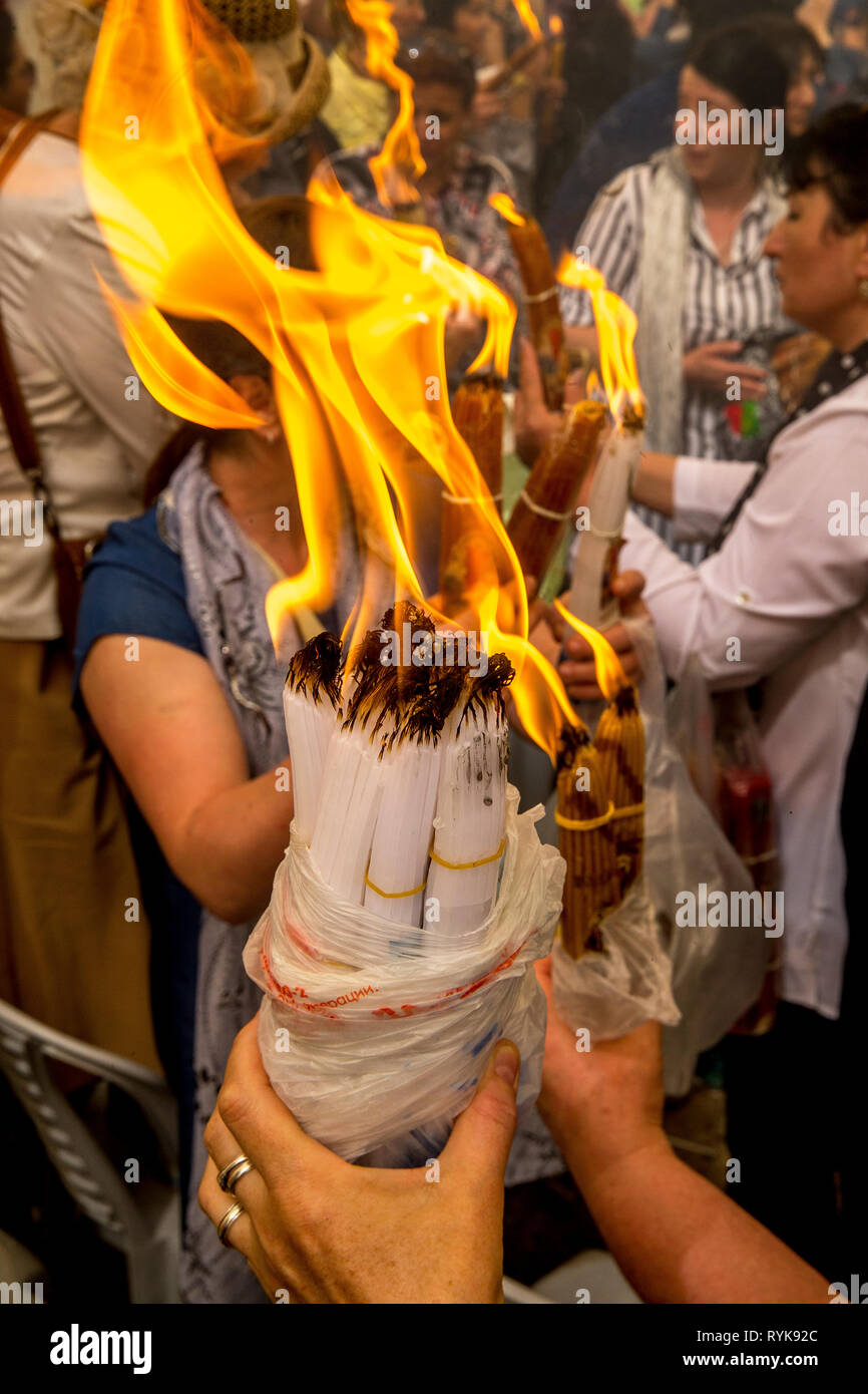 Christians celebrating orthodox Easter in Jerusalem, Israel. Holy fire ceremony. Stock Photo