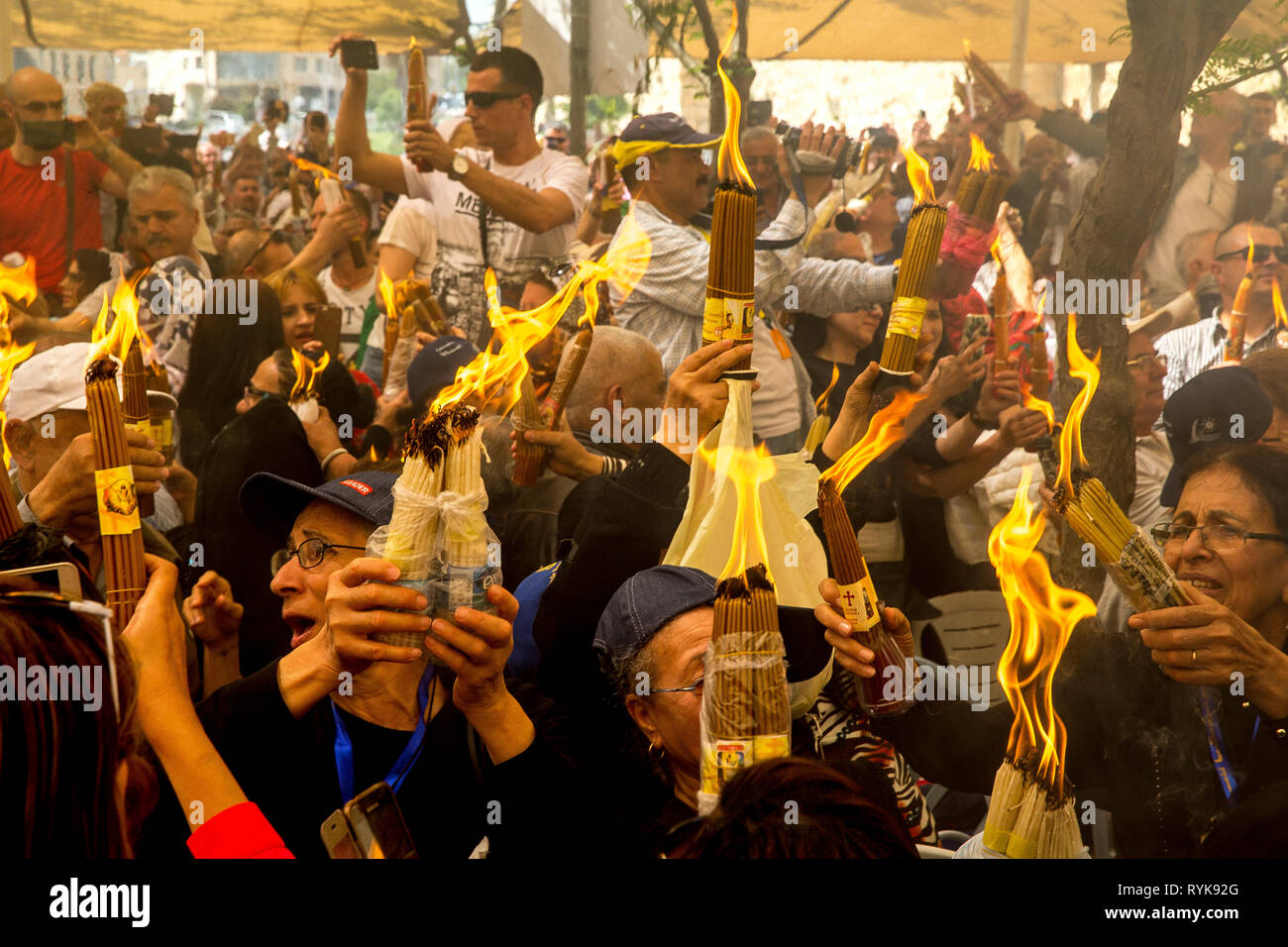 Christians celebrating orthodox Easter in Jerusalem, Israel. Holy fire ceremony. Stock Photo