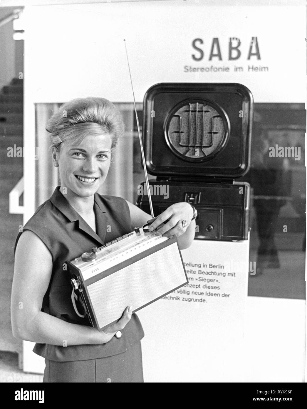 broadcast, radio, radio sets, Saba Transeuropa Automatic, young woman with a portable radio, behind a Saba 41W from 1930, Great German Radio Show, Berlin, 30.8. - 8.9.1963, Additional-Rights-Clearance-Info-Not-Available Stock Photo