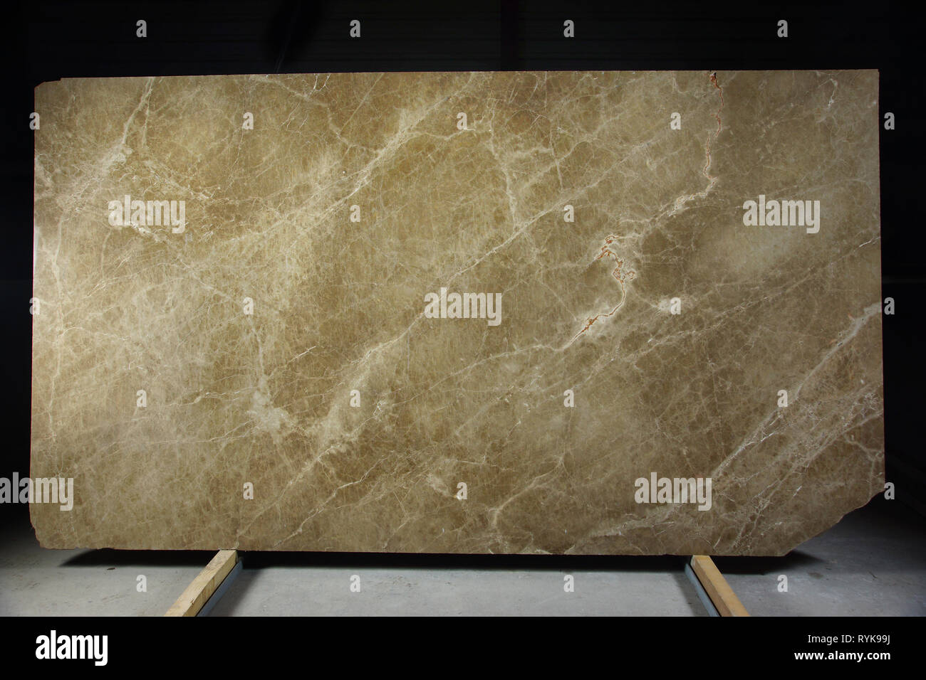 A Large Slab Of Natural Marble From Italy Brown In Color With Cracks And Streaks Is Called Emperador Light Stock Photo Alamy