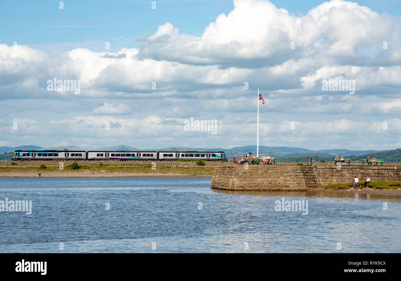 View of Arnside pier and railway viaduct, Morecambe Bay, Arnside, Cumbria, England. Stock Photo