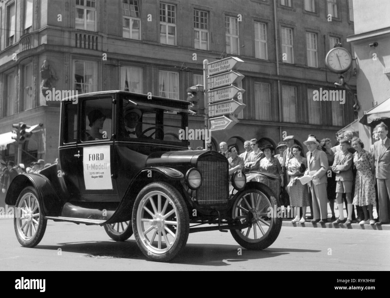transport / transportation, cars, vehicle variants, Ford Model T 1923, at a vintage car parade, Munich, 1959, Tin Lizzie, street, streets, motor car, auto, automobile, passenger car, motorcar, motorcars, autos, automobiles, passenger cars, vehicle, vehicles, small car, coupe, vintage car, vintage cars, parades, military parade, West Germany, Western Germany, Germany, 1920s, 20s, 1950s, 50s, 20th century, people, transport, transportation, cars, car, historic, historical, Additional-Rights-Clearance-Info-Not-Available Stock Photo