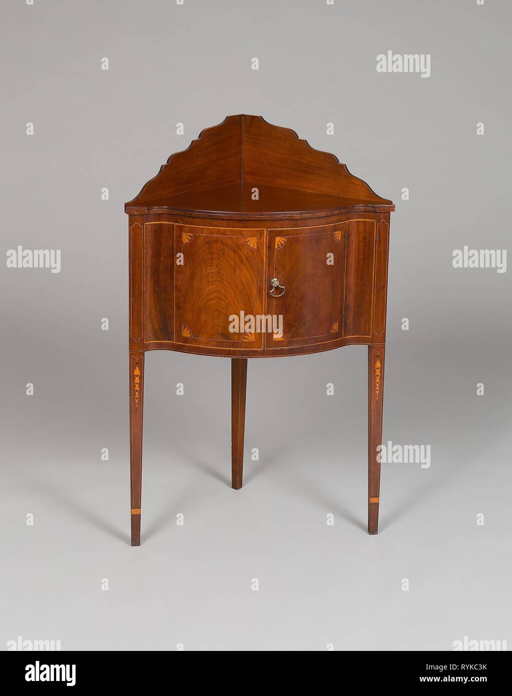 Corner Basin Stand. American; New York or possibly Connecticut. Date: 1790-1800. Dimensions: 94.3 × 59.1 × 41.9 cm (37 1/8 × 23 1/4 × 16 1/2 in.). Mahogany with white pine and cherry, and light-colored inlays. Origin: Connecticut. Museum: The Chicago Art Institute, Chicago, USA. Stock Photo