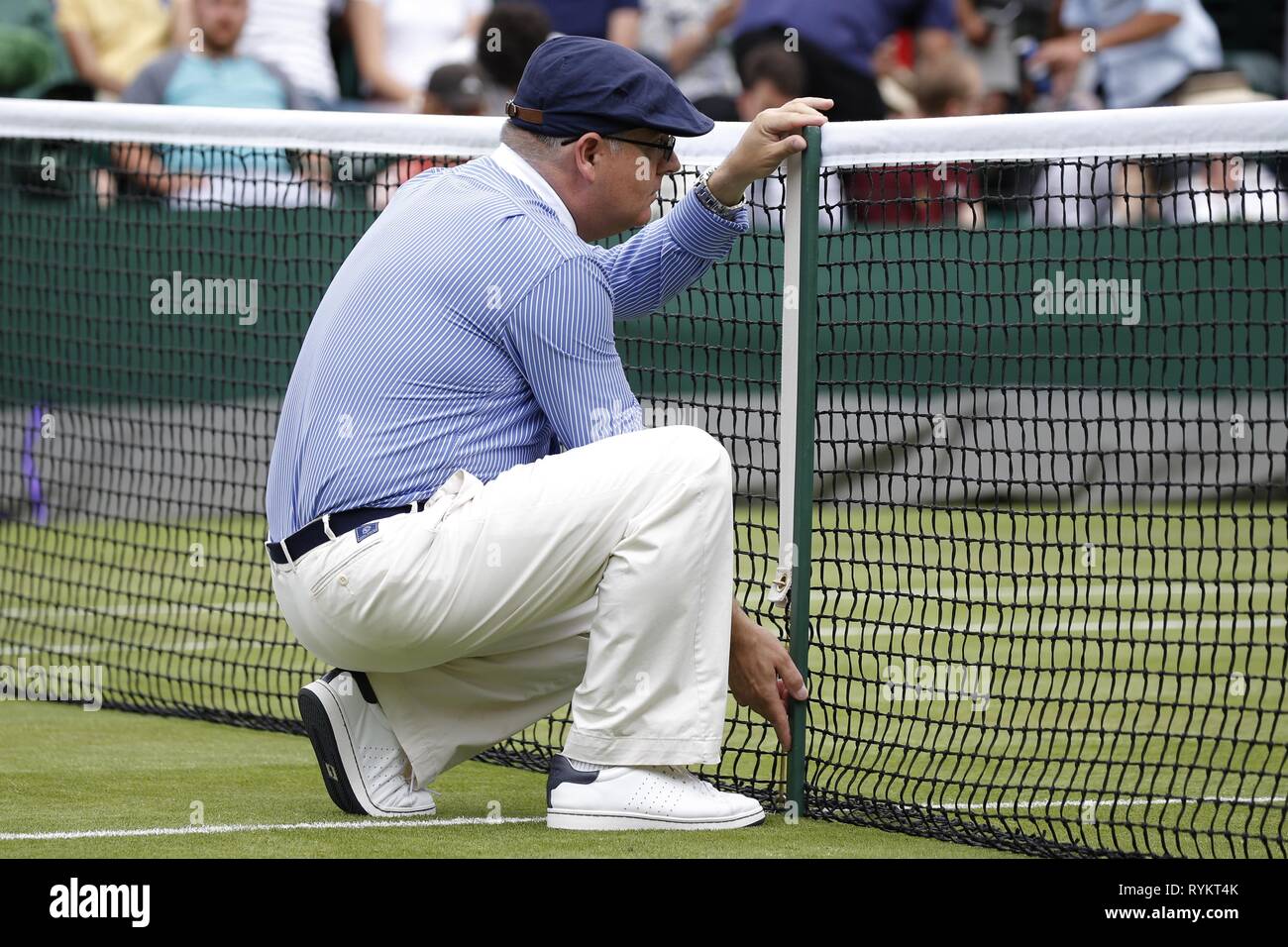 Court official checking net height hires stock photography and images