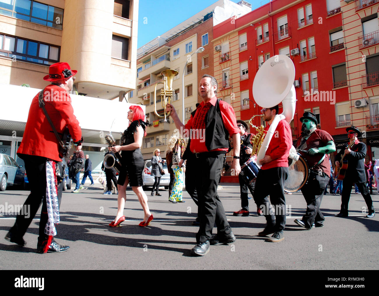 Madrid, Spain, March 2nd 2019: Carnival parade, Members of Urban Voodo Machine playing and singing Stock Photo