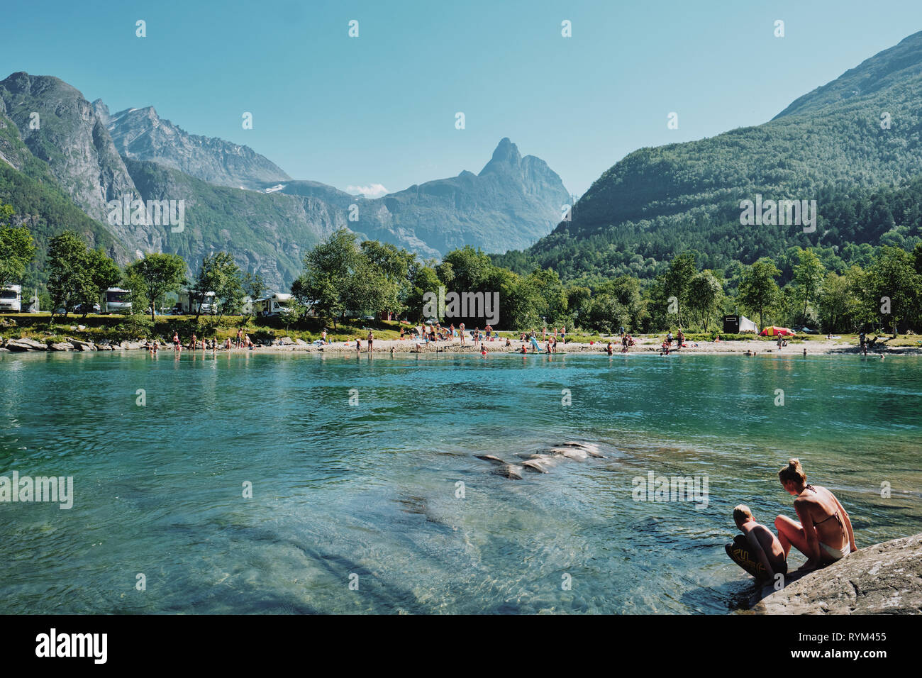 Bathers on the Rauma River in the summer landscape of the Romsdalen Valley near Åndalsnes, Norway Stock Photo