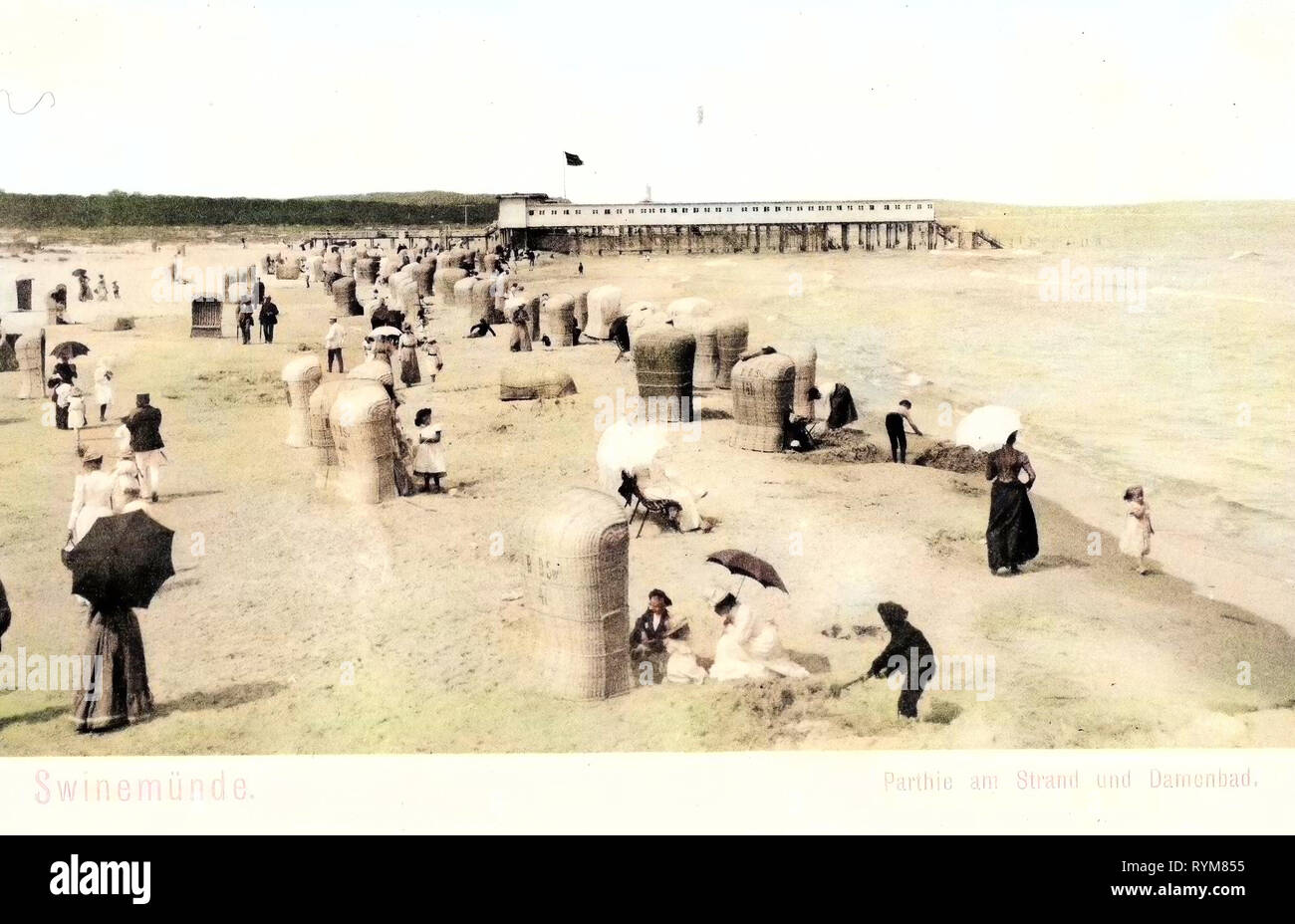 Beaches of Poland, Strandkorbs, Baths in Poland, Old, Świnoujście, 1903, West Pomeranian Voivodeship, Swinemünde, am Strand und Damenbad Stock Photo