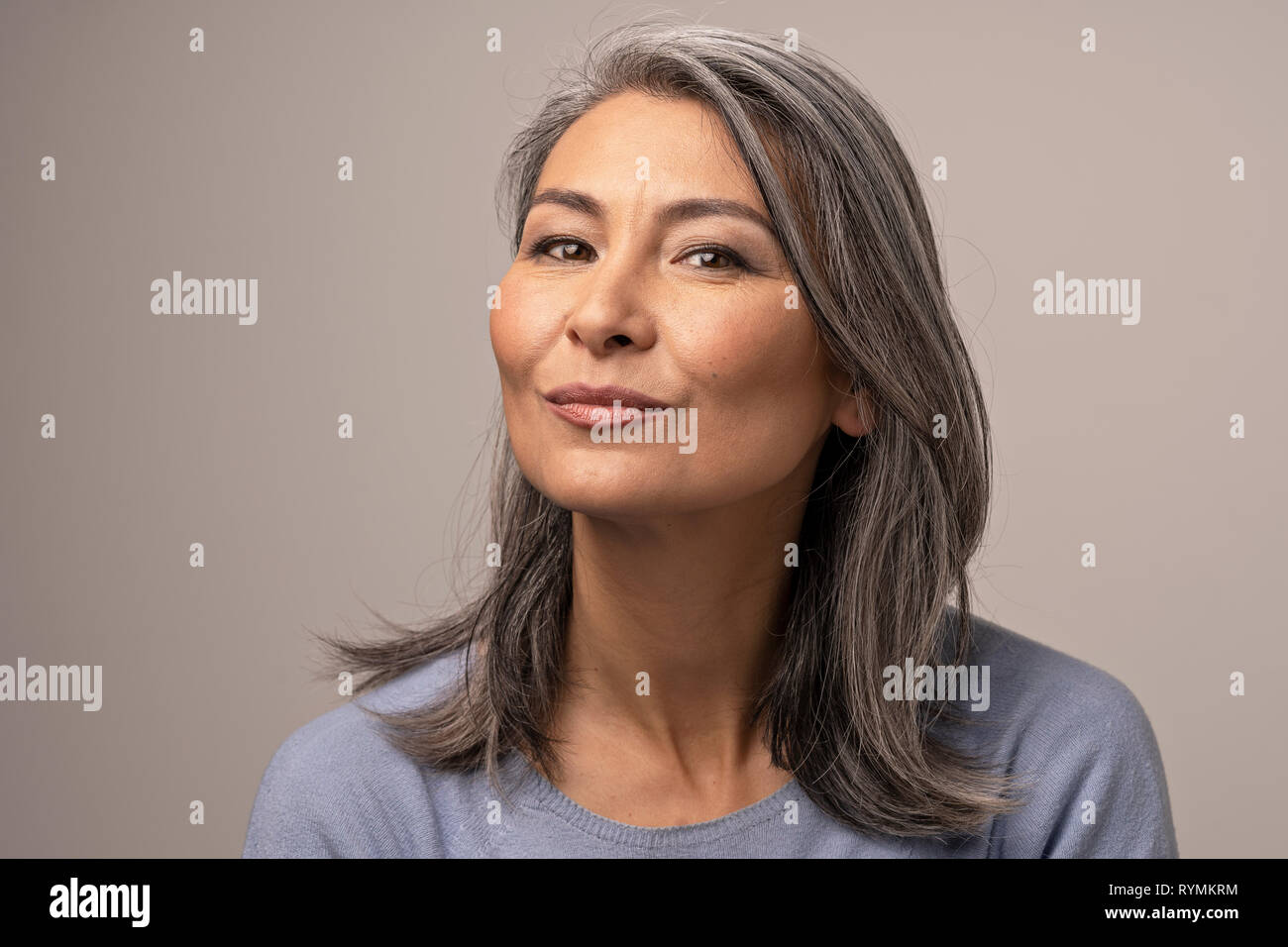 Woman smiling face asian mature hi-res stock photography and images - Alamy