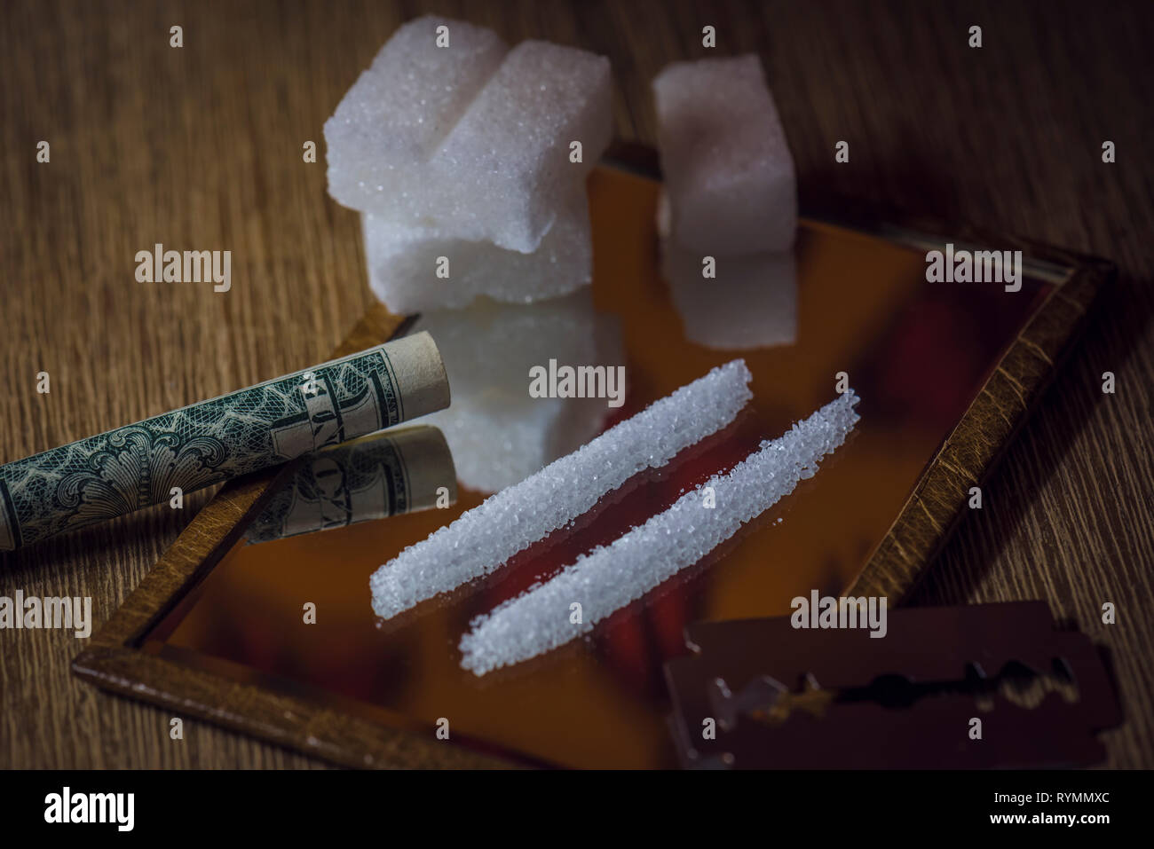 conceptual scene of sugar addiction causing health problems like real drugs. Stock Photo