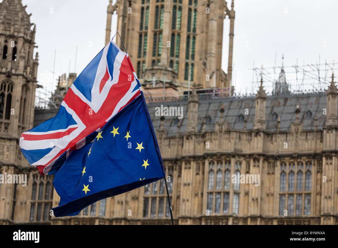 European Union and British Union Jack flag flying together.  Stock Photo