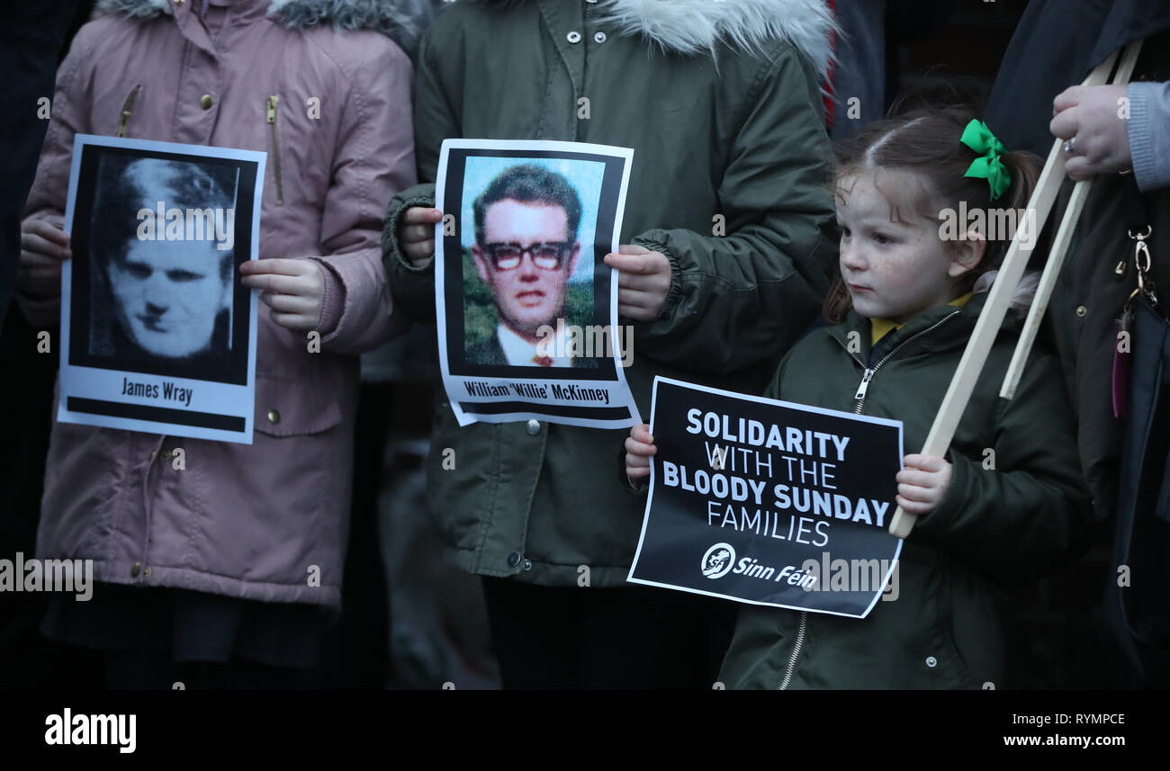 Pictures of Bloody Sunday victims James Wray and William McKinney during a vigil in West Belfast Northern Ireland, after the announcement from the Public Prosecution Service that one former paratrooper, soldier F is to be charged with two murders and four attempted murders during Bloody Sunday in Londonderry in 1972. Stock Photo