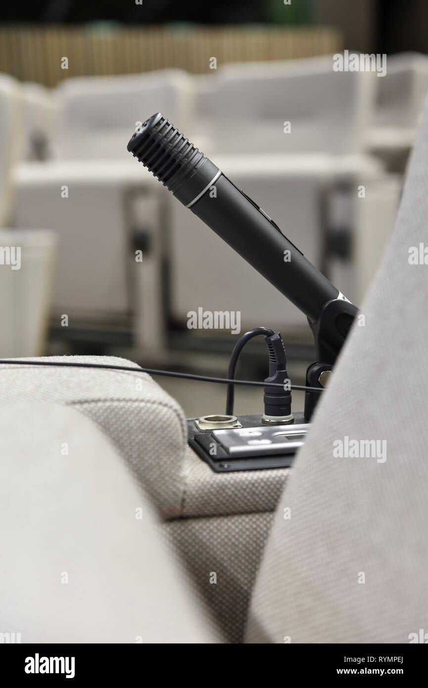 Detail shot with a press microphone in a conference room Stock Photo