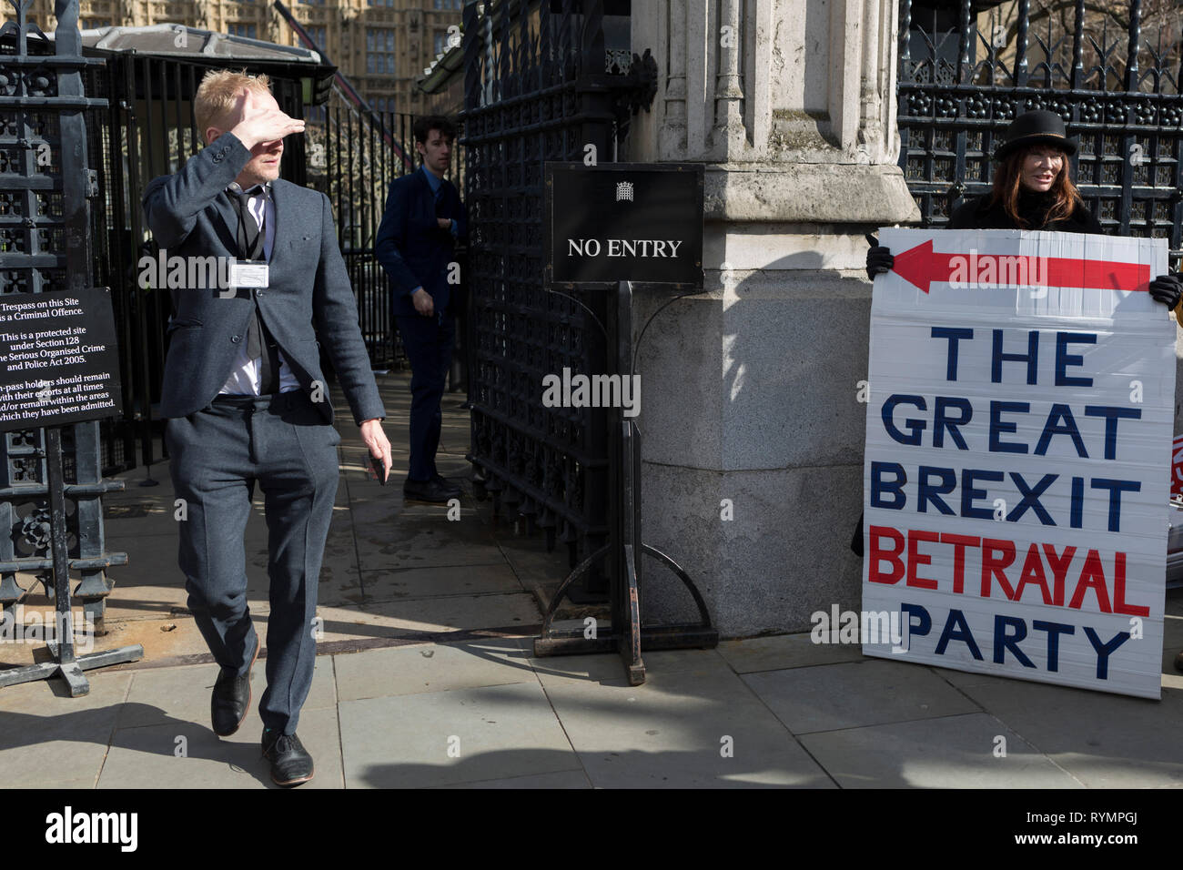 On the day that MPs in Parliament vote on a possible delay on Article 50 on EU Brexit negotiations by Prime Minister Theresa May, Brexiteer activists protest at the gates of the House of Commons, on 14th March 2019, in Westminster, London, England. Stock Photo