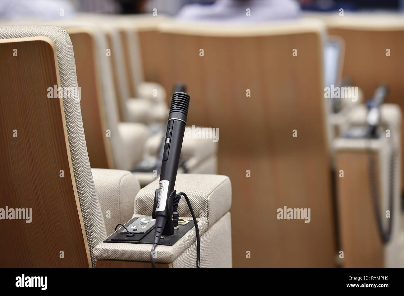 Detail shot with a press microphone in a conference room Stock Photo