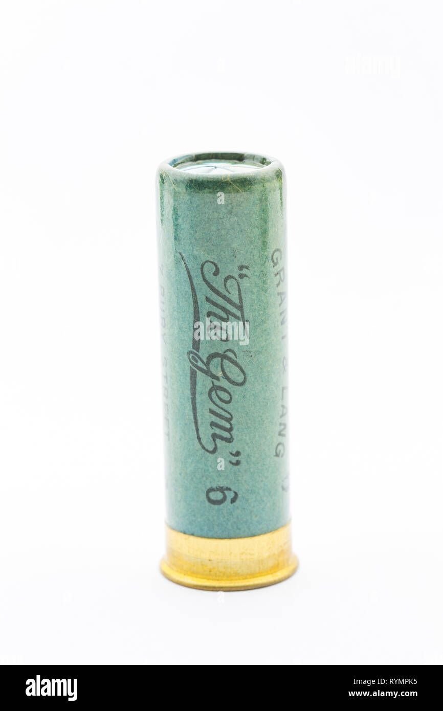 An old paper cased Atkin, Grant & Lang 16-bore, or gauge, shotgun cartridge  with a crimped closure and loaded with No 6 lead shot. This particular one  Stock Photo - Alamy