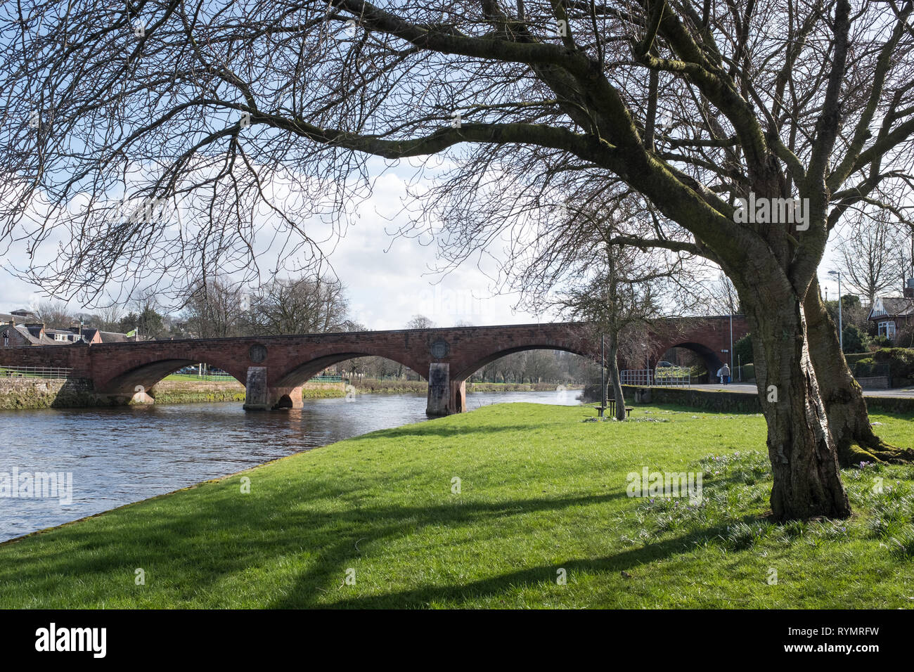 A view of St. Michael's Bridge over the River Nith in Dumfries, Scotland. Stock Photo