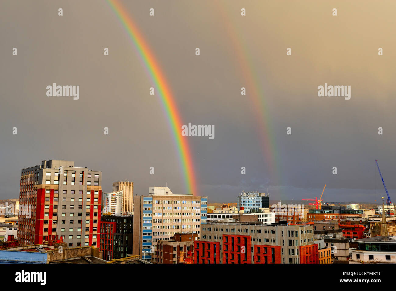Double rainbow over buildings in the centre of Bristol, UK Stock Photo