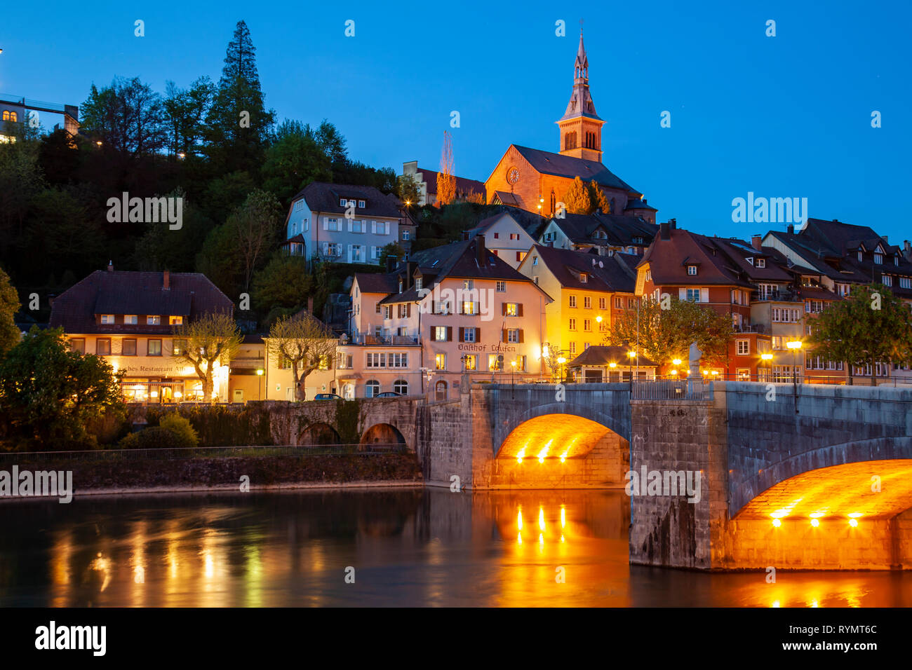 Evening in Laufeburg, Germany. Bridge over Rhine river connecting the German and Swiss part of the town. Stock Photo