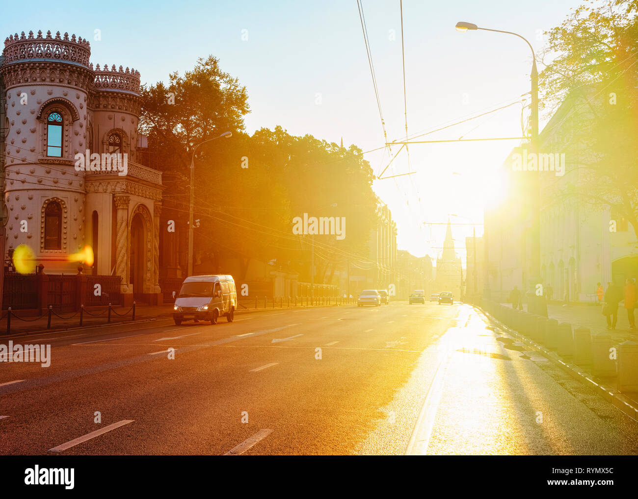 Romantic sunrise and street view with cars on the road in Moscow city center in Russia in the morning. Stock Photo