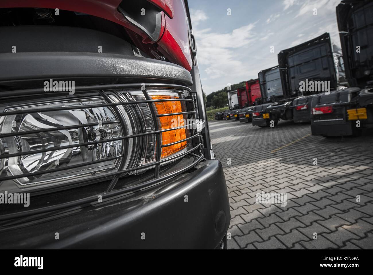 Semi Trucks Dealer Lot. Bran New Vehicles For Sale. Transportation Industry. Stock Photo