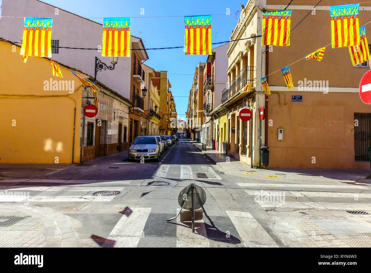 Valencia, El Cabanyal Canyamelar barrio, a street with flags of Region Valencia Spain Stock Photo
