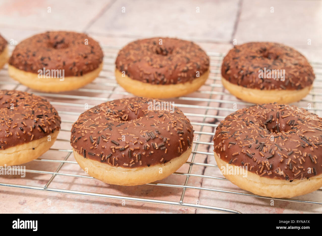 Chocolate ring donuts Stock Photo Alamy