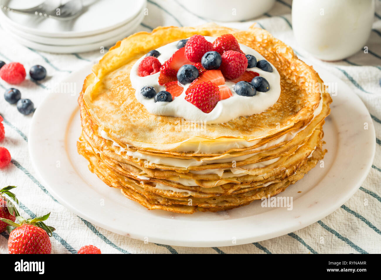 Sweet Homemade Layed Crepe Cake with Berries and Whippe Cream Stock Photo