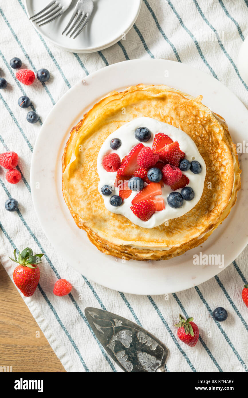 Sweet Homemade Layed Crepe Cake with Berries and Whippe Cream Stock Photo
