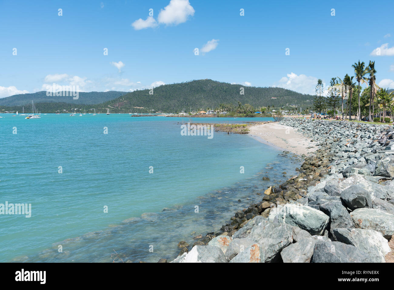 Blue water in protected bay at Airlie Beach, Queensland, Australia Stock Photo