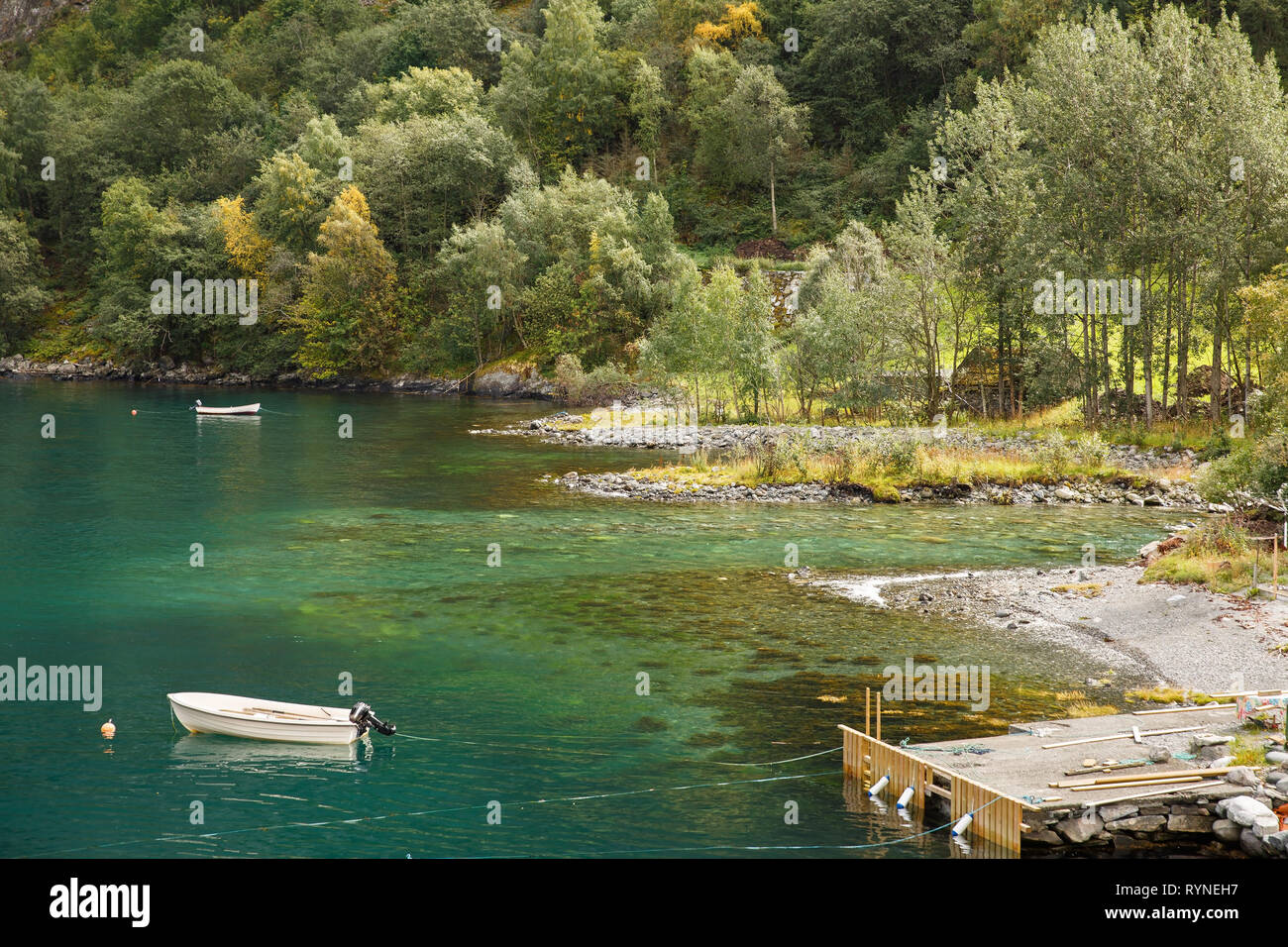 Landscape with Naeroyfjord, boats and mountain forest in Norway. Stock Photo