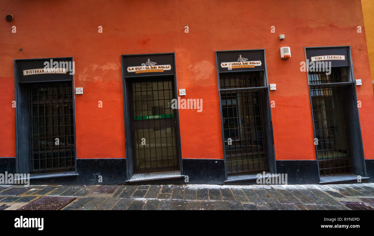 GENOA, ITALY - NOVEMBER 04, 2018 - Narrow streets of the old city with the doors Stock Photo