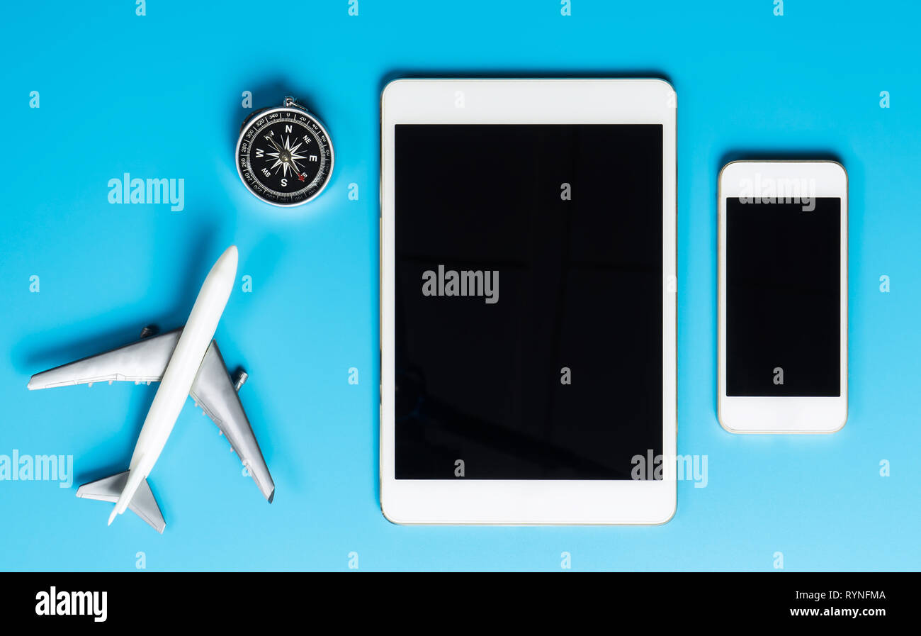 Travel toy plane compass and blank tablet and mobile device for mock up ...