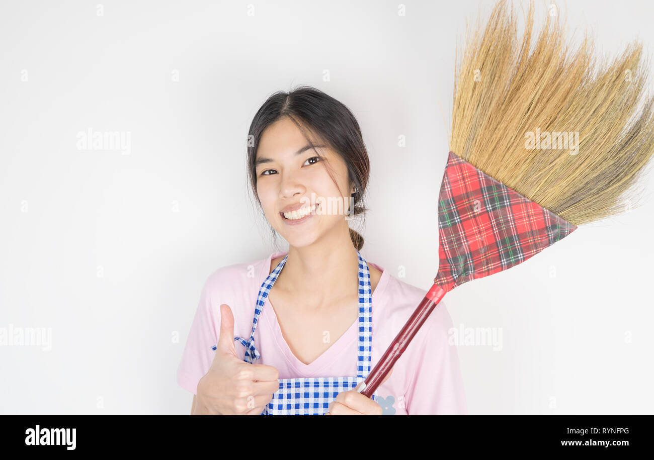 Person holding a broom hires stock photography and images Alamy