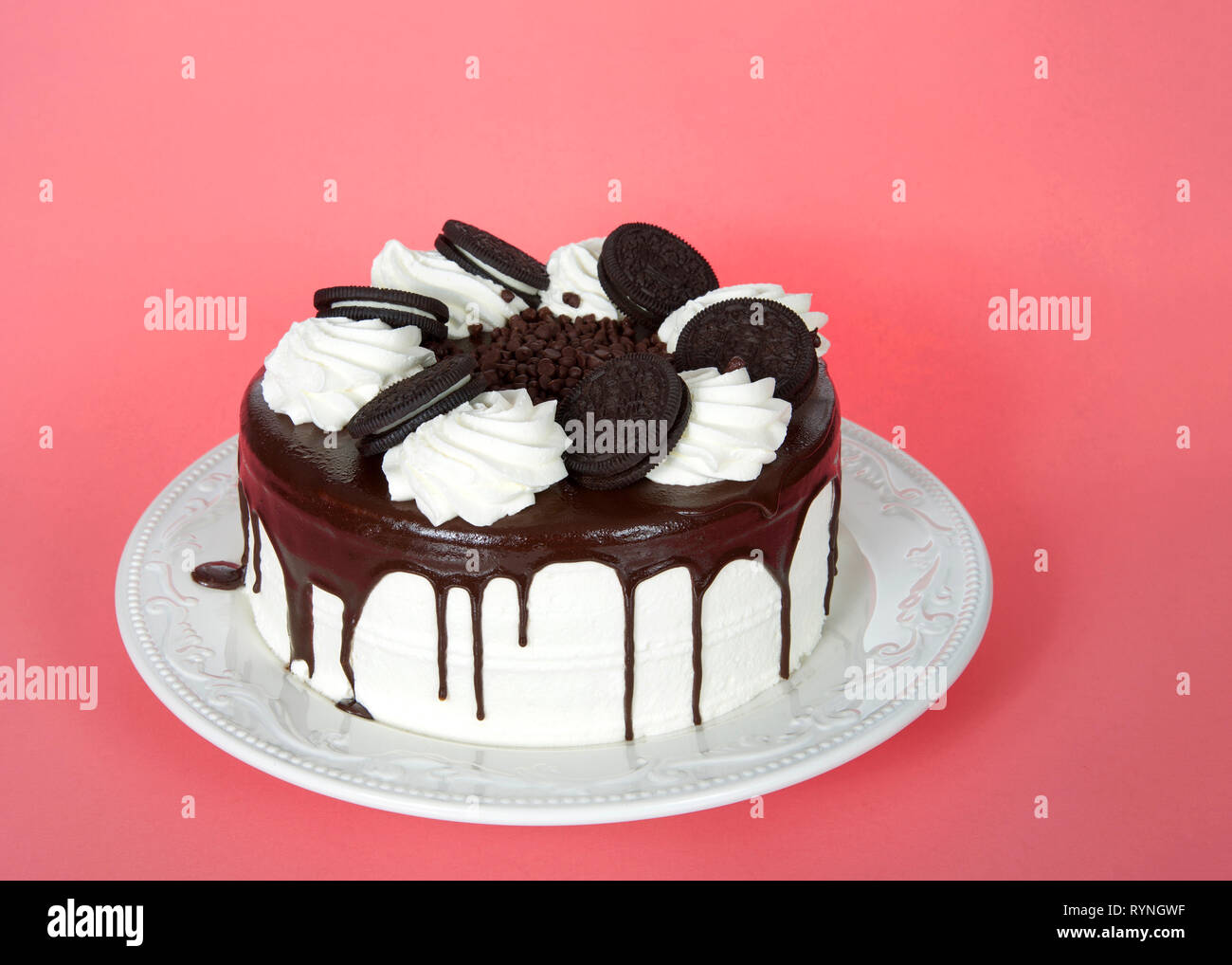 White Whipped Cream Frosted Cake With Chocolate Cream Filled
