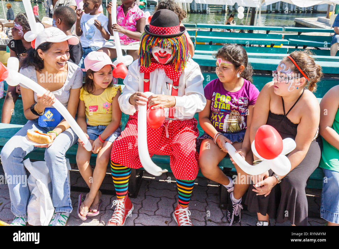 Miami Florida,Little Havana,Jose Marti Park,United Hearts Family Festival,festivals fair,community Hispanic woman female women,girl girls,youngster,ki Stock Photo