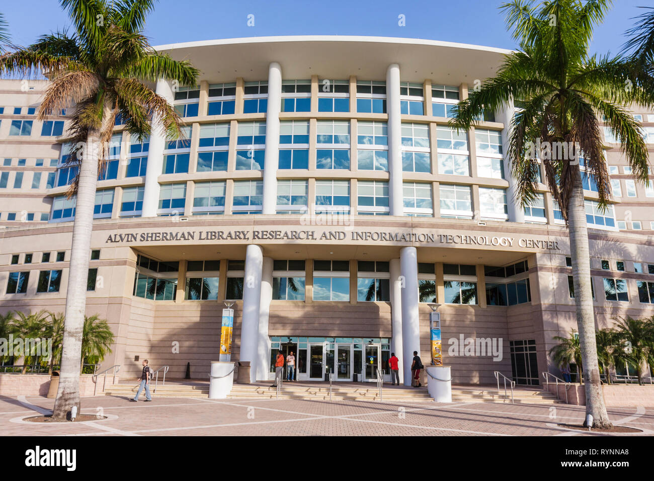 Florida Davie,Nova Southeastern University,Alvin Sherman Library,campus,higher education,school,student students building,palm trees,landscaping,walki Stock Photo