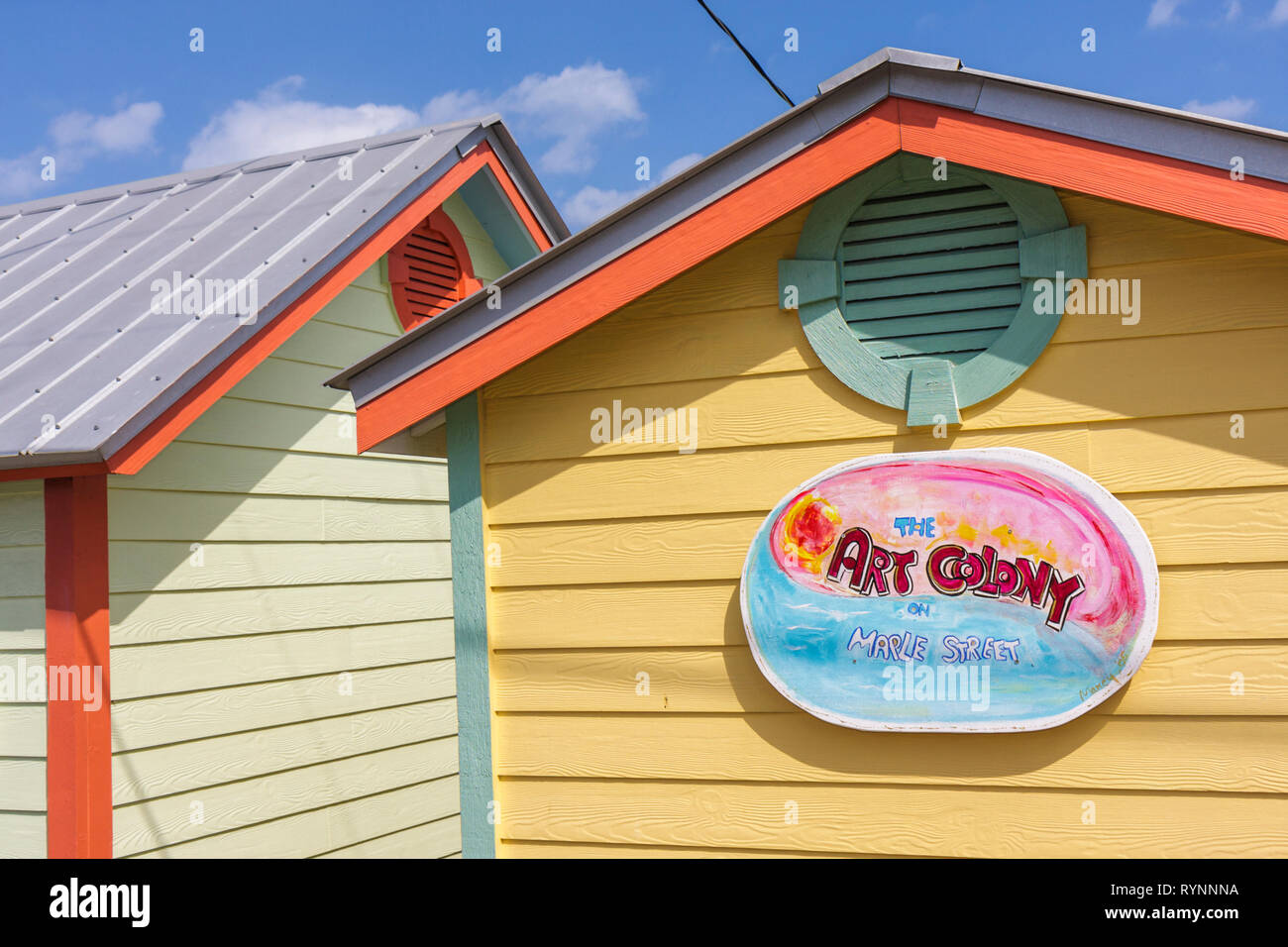 Florida Fl South Martin County Jensen Beach The Art Colony On Maple Street Cottage Gabled Tin Roof Colorful Pastel Colors Sign Logo Artsy Stock Photo Alamy