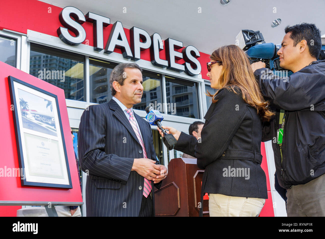 Miami Florida,Staples,office supply products store,chain,receives Green building Council LEED Gold Certification,Green movement,ceremony,man men male, Stock Photo