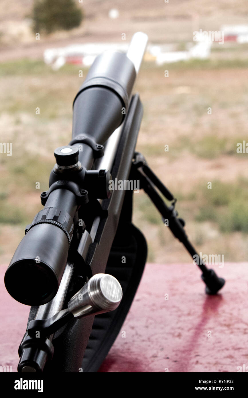 At shooting range competition, caliber 22 hunting rifle with scope. Stock Photo