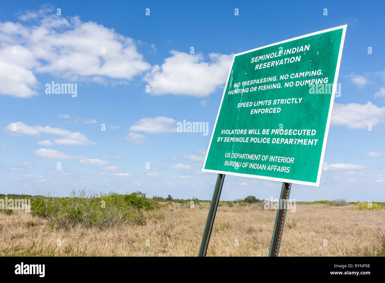 Florida Hendry County,Big Cypress,Seminole Indian Reservation,Native American Indian indigenous peoples,tribe,sign,green,no trespassing,speed limit,wa Stock Photo