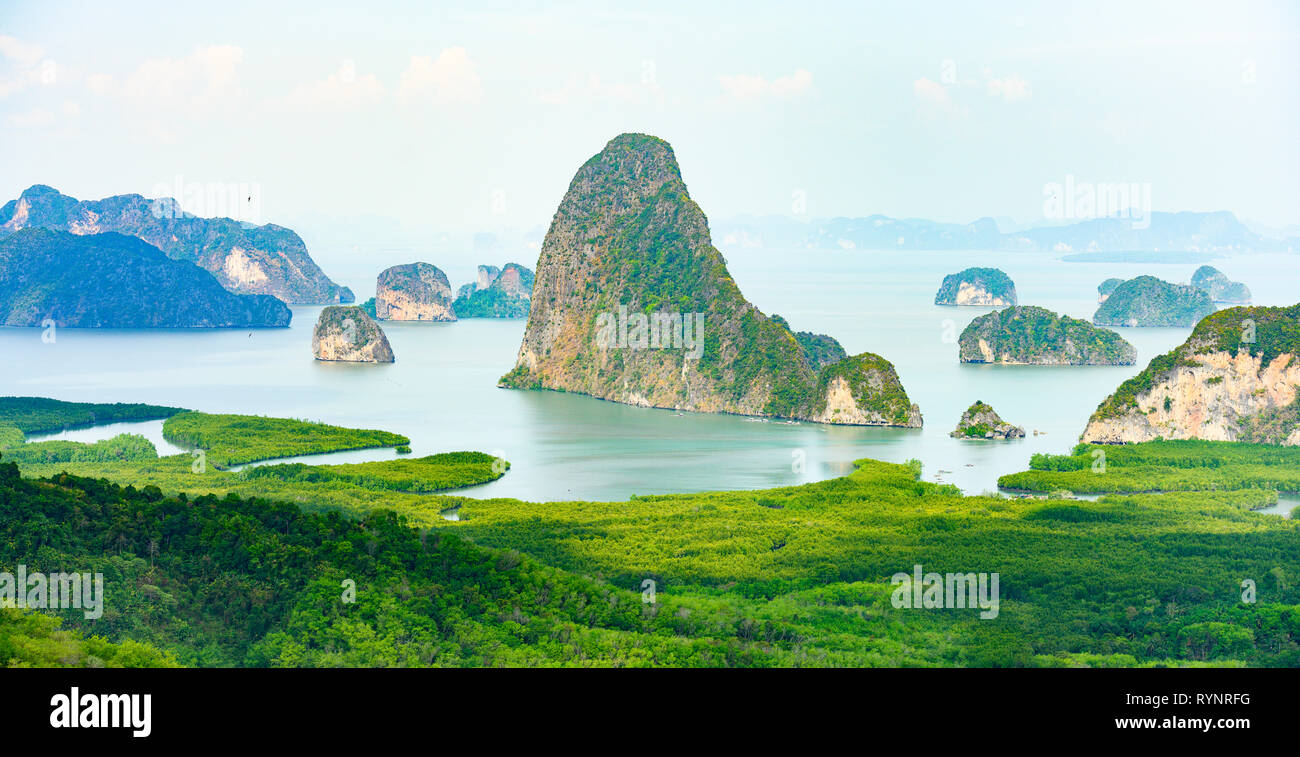 Stunning view of the beautiful Phang Nga Bay with the sheer limestone karsts that jut vertically out of the emerald-green water, Thailand. Stock Photo