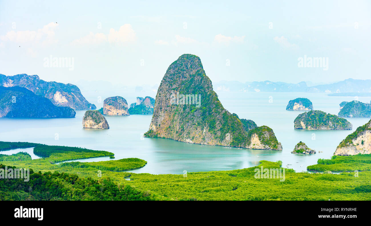 Stunning view of the beautiful Phang Nga Bay with the sheer limestone karsts that jut vertically out of the emerald-green water, Thailand. Stock Photo