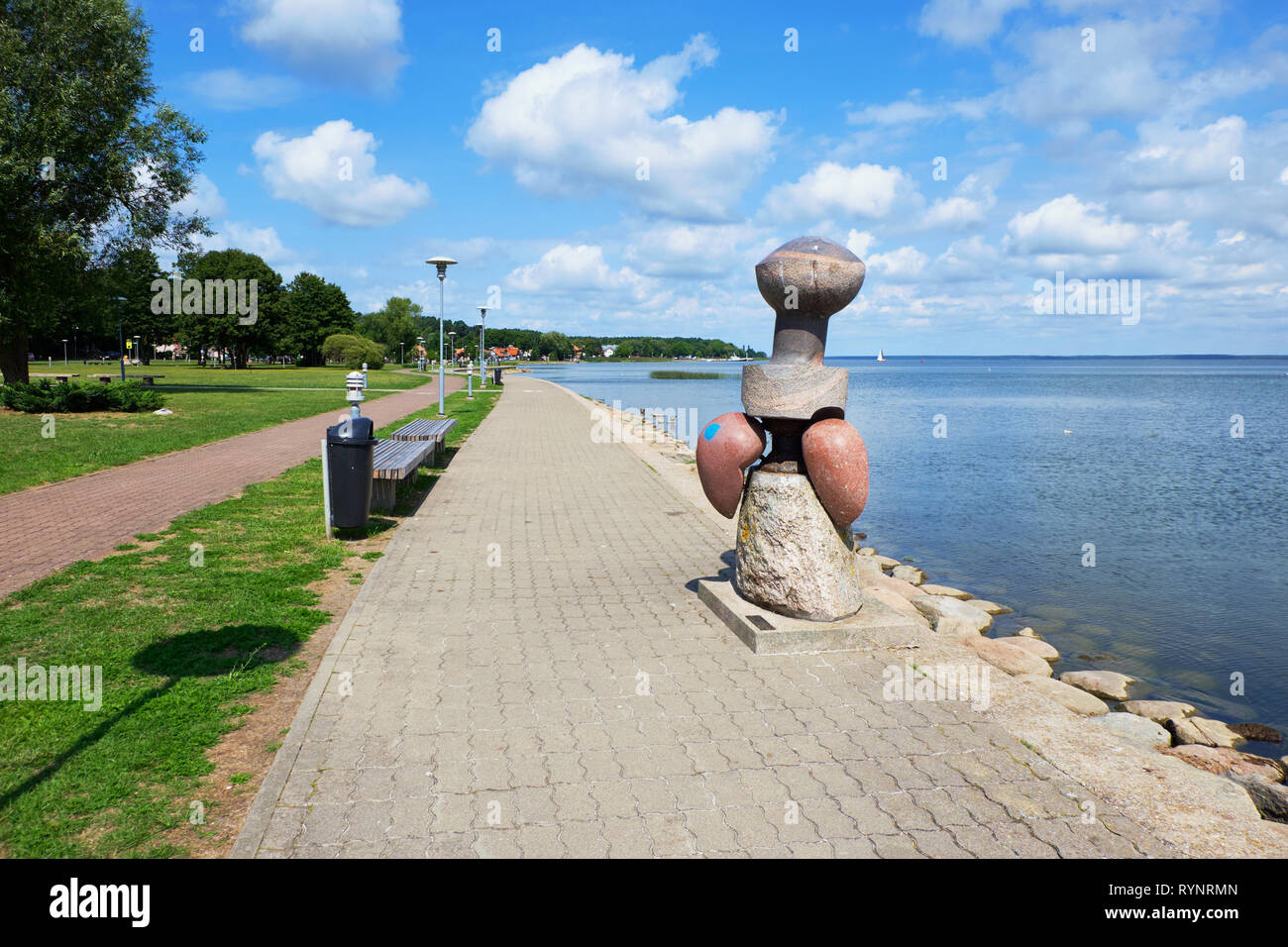 JUODKRANTE, LITHUANIA - AUGUST 06, 2018: Stone sculpture on the promenade. Juodkrante is a resort town at Curonian Spit  in Lithuania Stock Photo