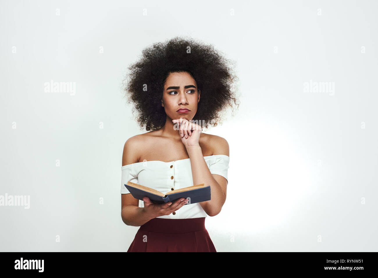 Reading A Book Thoughtful Young Afro American Woman With